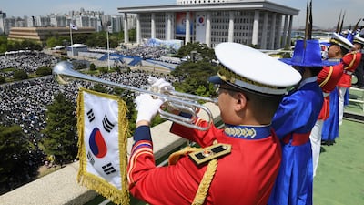 Troops present a guard of honour. Reuters