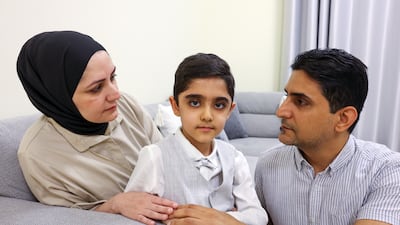 Yousef Hayder Al Waaeli with his parents Hayder and Jehan Ali at their home in Dubai. Chris Whiteoak / The National