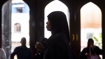 An Indian Muslim woman waits to get vaccinated ahead of the Hajj pilgrimage beginning on June 26. EPA