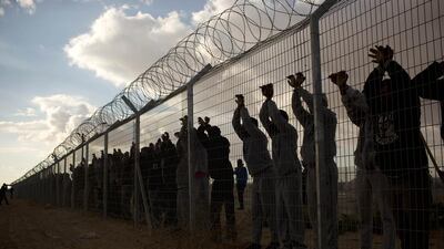 African migrants at the Holot detention centre. Tens of thousands from Eritrea and Sudan living in Israel have been detained or ordered to report to a detention centre. Oded Balilty / AP Photo