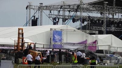 Crew attend to fallen metal structure at Backstreet Boys concert in Thackerville, Oklahoma, US. Reuters