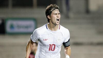 Philip Younghusband, the Philippines captain, celebrates scoring the goal that qualified his side for the 2019 Asian Cup in the UAE. Mark R Cristino / EPA