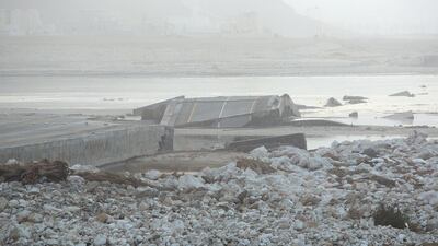 A close-up shot of the remnants of a portion of Sultan Qaboos Highway which was washed away in the storm, on the eastern side of Mughsail Beach. Antony Hansen for The National