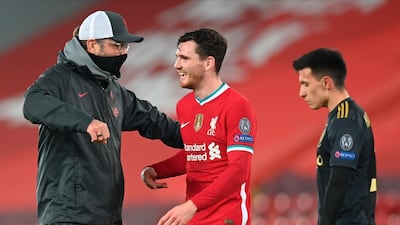 Jurgen Klopp celebrates with Andrew Robertson after Liverpool's win over Ajax. EPA