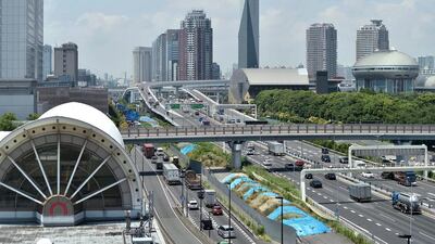 Vehicles on a highway in Tokyo's bay area Ariake. The sluggish economy is expected to slow in the second quarter despite the better than anticipated first quarter, economists said. Kazuhior Nogi/AFP