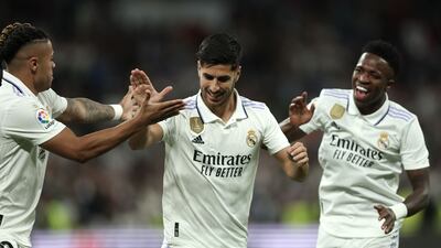 Marco Asensio celebrates with Vinicius Junior and Mariano Diaz after scoring for Real Madrid against Getafe. AFP