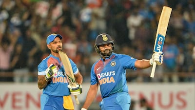 Rohit Sharma, right, missed out on a century in the second T20 against Bangladesh in Rajkot on Thursday. AFP