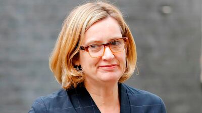 Britain's Home Secretary Amber Rudd arrives at 10 Downing Street in central London on April 25, 2018. / AFP PHOTO / Tolga AKMEN
