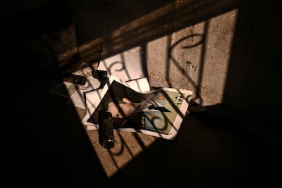 A portrait of removed Syrian president Bashar Al Assad in the town of Adra on the north-east outskirts of Damascus, on December 16. AFP