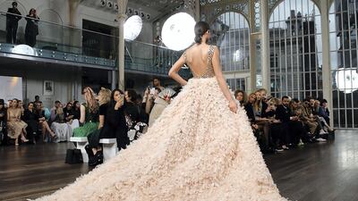 Designer Rayan Al Sulaimani sent down opulent gowns featuring sequins and feathers. Photo: Daniel John Cotton Wall