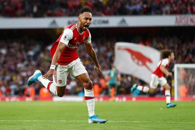 Pierre-Emerick Aubameyang celebrates his late winner for Arsenal against Aston Villa. Getty