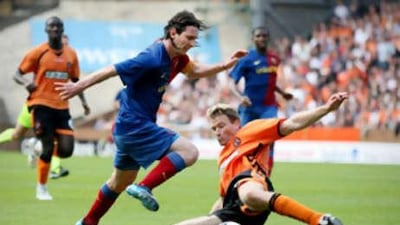 Barcelona's Lionel Messi, left, will no longer be competing in Beijing.