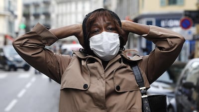 A parishioner reacts near the Notre Dame church. EPA