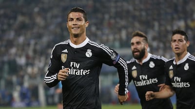 Cristiano Ronaldo begins to celebrate with teammates Dani Carvajal and James Rodriguez after scoring Real Madrid's goal against Juventus on Tuesday night in the Champions League. Sergio Perez / Reuters