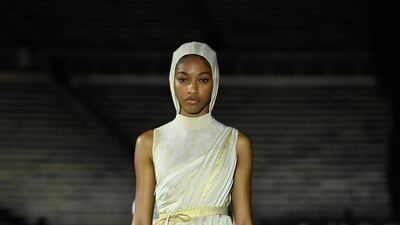 A model walks the runway during the Dior Cruise show 2022 at Panathenaic Stadium on June 17, 2021 in Athens, Greece. Getty Images