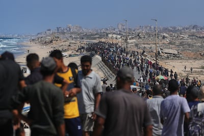 Displaced Palestinians return to Gaza city after the ceasefire between Hamas and Israel began. AP