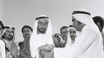 The Founding President, Sheikh Zayed raises the flag at Union House in Dubai, December 2, 1971, marking the unification of the UAE. Courtesy: Al Ittihad