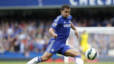 Eden Hazard’s penalty in the 3-1 loss in Paris was vital in Chelsea’s success last term, but the Belgium playmaker was happy to flirt with his admirers after PSG scarcely disguised their interest in recruiting him, wearing the Parisiens’ shirt. (AP Photo/Sang Tan)