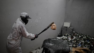 Smash rooms, like this one in Beijing, China, are becoming increasingly popular as a way to get emotions out of your system. Wu Hong / EPA