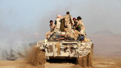 Pro-government forces patrol during clashes against Houthi rebels in Yemen's Dhubab region on January 11, 2017. Saleh Al Obeidi/AFP