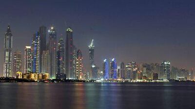 Dubai's economy grew at a rate of 4.1 per cent year-on-year during the first half of this year. Above, the Dubai Marina and Jumeriah Beach Residences skyline. Jeff Topping/The National