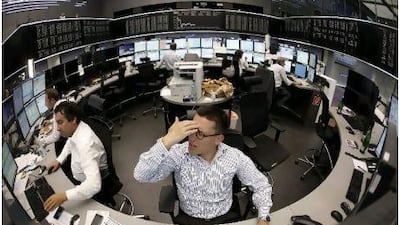 A trader reacts at his desk at the Frankfurt stock exchange yesterday as European shares extended the previous session's sharp sell-off on Friday. Reuters