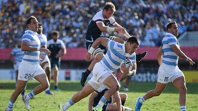 Argentina's scrum-half Gonzalo Bertranou (C) runs to score a try during the Japan 2019 Rugby World Cup Pool C match between Argentina and the United States at the Kumagaya Rugby Stadium in Kumagaya. AFP