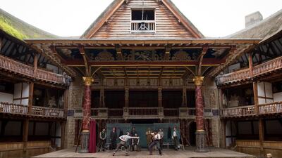 Members of the cast of a touring production of William Shakespeare’s “Hamlet” perform during a photocall at the Globe theatre in London in 2014. The theatre has been a major tourism attraction since it opened in 1997. AFP Photo/Leon Neal