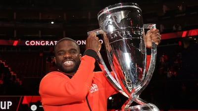 Frances Tiafoe poses with the Laver Cup trophy. Getty