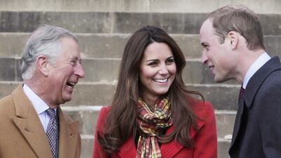 Prince Charles, Kate, and Prince William share a joke on a visit to Dumfries House in Scotland in March 2013.