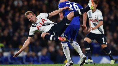 Tottenham Hotspur's English striker Harry Kane (L) goes to ground in a challenge against Chelsea's English defender John Terry (R) during the English Premier League football match between Chelsea and Tottenham Hotspur at Stamford Bridge in London on May 2, 2016. AFP/BEN STANSALL