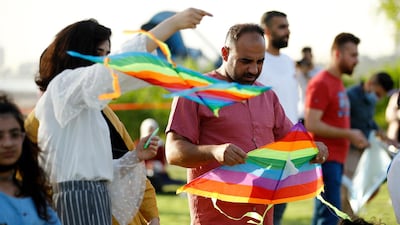Hundreds of Iraqis participated in the kite festival. AP