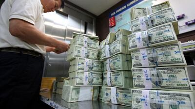 The Dollar Index, a measure of the value of the dollar against a basket of major currencies, slid 3.67 per cent on the month. SeongJoon Cho / Bloomberg