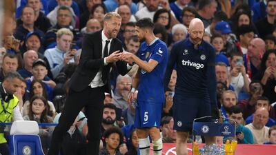 Chelsea manager Graham Potter giving instructions to Jorginho. Getty