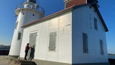 Cleveland Harbour West Pierhead Light in Ohio is on sale, with bids starting at $25,000. Photo: GSA Auctions