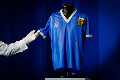 Diego Maradona’s match-worn shirt from Argentina’s 1986 World Cup quarter-final against England on display at Sotheby’s in London before its auction in 2022. Getty Images