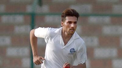 Mohammad Amir in action during Pakistan's Grade-II tournament in Karachi. Rizwan Tabassum / AFP
