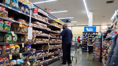 A shopper in a grocery store in Oakland, California. US Labour Department data showed sharply higher food and record gas prices pushed inflation up 8.6 per cent last month from a year earlier. EPA