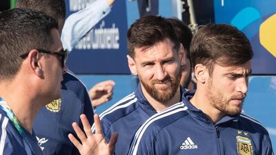 Argentina captain Lionel Messi, centre, waves as he and teammates leave the hotel prior a training session in Rio de Janeiro, Brazil, ahead of Friday's quarter-final match with Venezuela at the 2019 Copa America. EPA