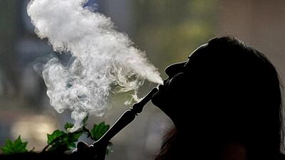The flavouring of shisha tobacco should be stopped so that young people will not be attracted to it. Marwan Naamani / AFP