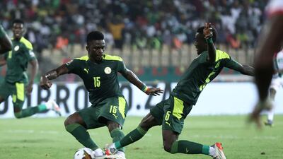 Idrissa Gueye scores Senegal's second goal just beating teammate Bamba Dieng to the ball. AFP