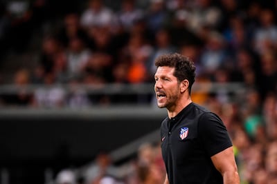 Atletico Madrid manager Diego Simeone seems to believe continuity leads to a strong identity at a football club. Jonathan Nackstrand / AFP