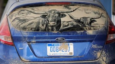 Scott Wade begins with a dirty canvas and within the hour, he turns the dusty car window into works of art using intricate strokes and tools.