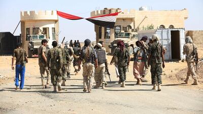 Pro-government forces seized Al Hazm after making significant gains in the neighbouring province of Marib. Here, soldiers loyal to Yemen's president Abdrabu Mansur Hadi walk outside the Mass army barracks in Marib on December 18, 2015, after retaking it from the Houthis. Ali Owidha/Reuters