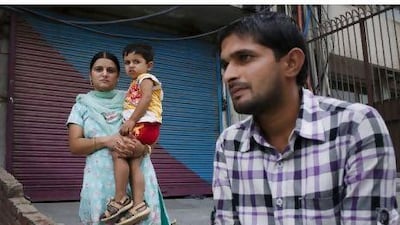 Among the family members of the MV Iceberg I's crew waiting for news of their fate is Jaswinder Singh's wife Nirmal Singh, holding their son Abhimanyu, and his brother Rigan Singh.