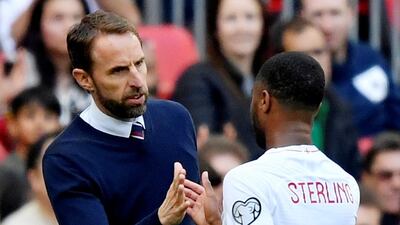 England manager Gareth Southgate shakes hands with Raheem Sterling after the England player was substituted against Bulgaria last week. Reuters