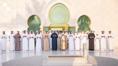 President Sheikh Mohamed; Sheikh Mansour; Sheikh Abdullah bin Zayed, Deputy Prime Minister and Minister of Foreign Affairs; Sheikh Nahyan bin Mubarak, Minister of Tolerance and Coexistence; Sheikh Khaled bin Mohamed, Crown Prince of Abu Dhabi; Sheikh Mohamed bin Hamad bin Tahnoon, Adviser to the President; Sheikh Nahyan bin Zayed, Chairman of the Board of Trustees of Zayed bin Sultan Al Nahyan Charitable and Humanitarian Foundation; Dr Omar Habtoor Al Darei, Chairman of the General Authority for Islamic Affairs, Endowments and Zakat; Dr Mohamed Saeed Al Badi; Sheikh Hamed bin Zayed; Sheikh Saif bin Zayed; Sheikh Mohamed bin Khaled; Sheikh Saeed bin Mohamed; and Shaykh Abdallah bin Bayyah pray at the grave of UAE Founding Father, the late Sheikh Zayed bin Sultan Al Nahyan, after Eid Al Fitr prayers at the Sheikh Zayed Grand Mosque. Ryan Carter / UAE Presidential Court