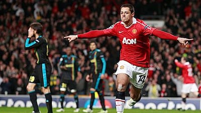 Javier Hernandez celebrates one of his goals during Manchester United's 2-1 win against Marseille at Old Trafford.