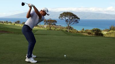 Collin Morikawa plays his shot from the seventh tee during the first round of the Sentry Tournament Of Champions. AFP
