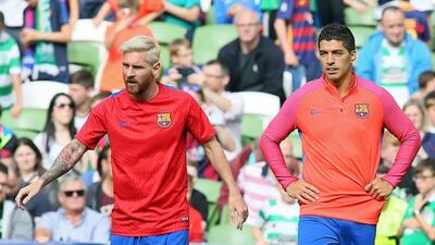 Barcelona's Lionel Messi and Luis Suarez before their friendly against Celtic in Dublin on Saturday. Paul Faith / AFP / July 30, 2016
